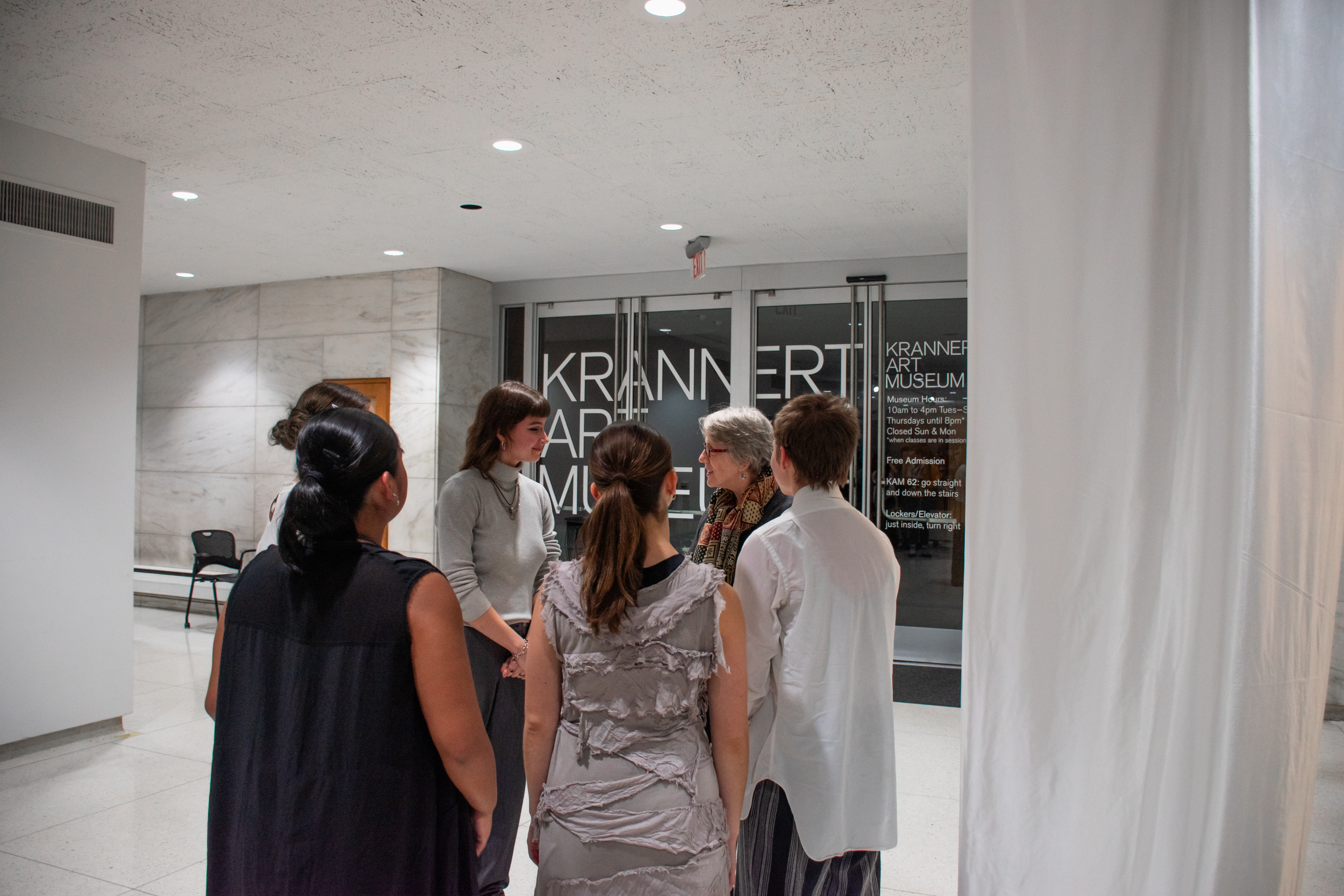 External juror Lindsay Olson (right) talks with choreographer Avi Pellegrinetti and the dancers who performed EIGENSTATE.