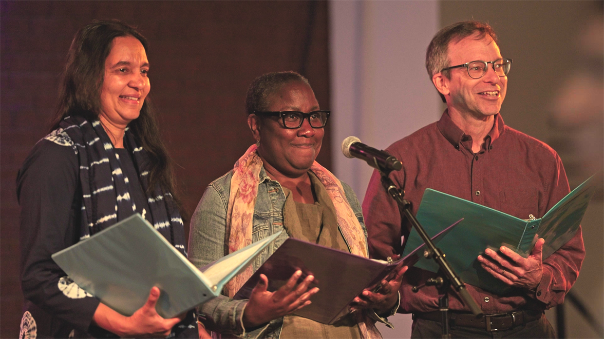 Pictured left to right, Illinois Physics Professor Smitha Vishveshwara and her primary collaborators&amp;nbsp;Illinois Theater Professor Latrelle Bright and Illinois Music Professor Stephen Taylor speak at a performance of &amp;lt;em&amp;gt;Quantum Voyages&amp;lt;/em&amp;gt; at the Krannert Center for the Performing Arts. Photo by Nic Morse, Illinois Grainger Engineering&amp;nbsp;