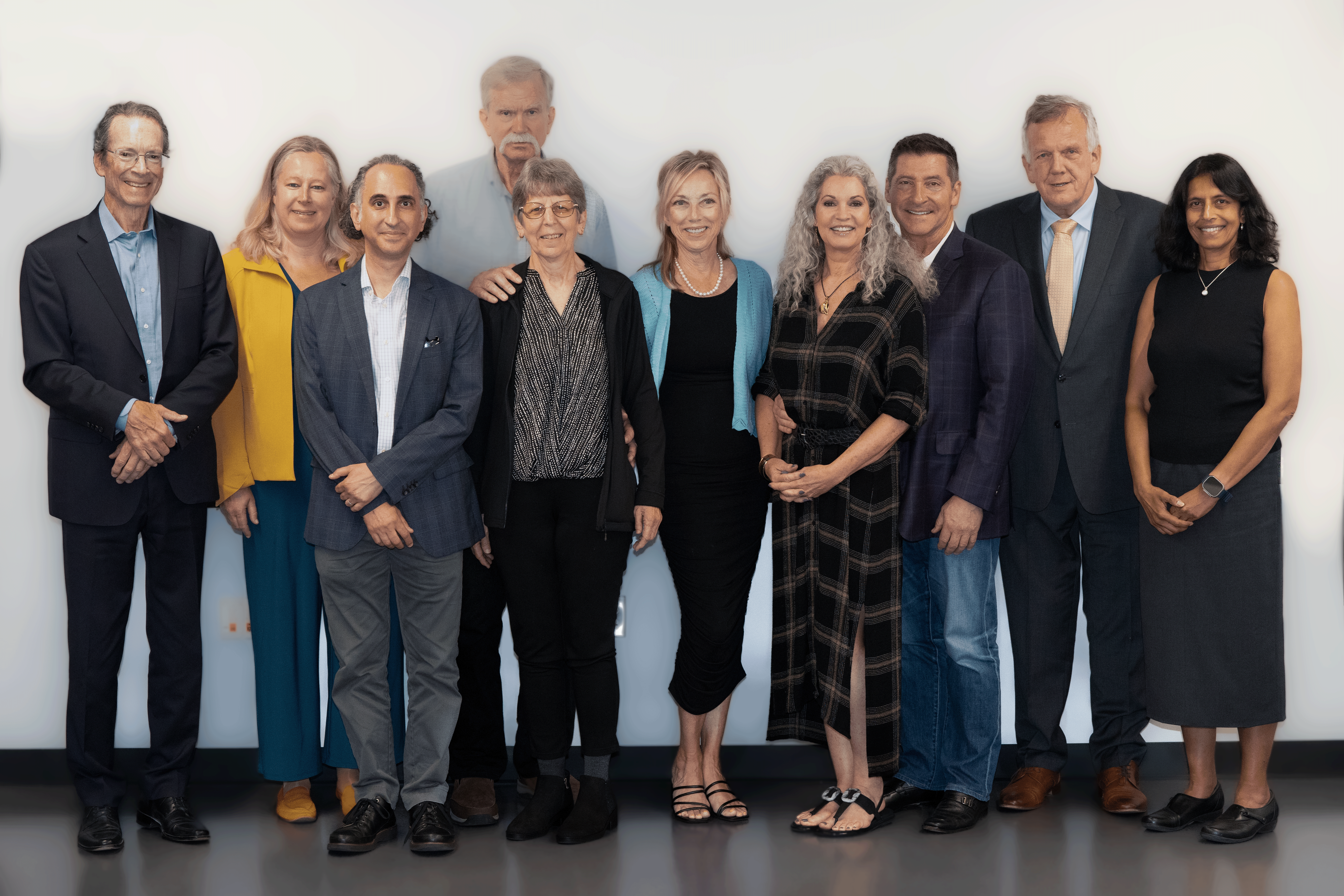 Illinois Physics faculty members pose with the family of the late Dr. Paul Parks.