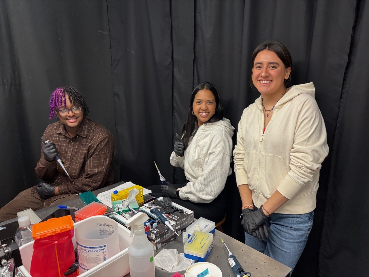 TEAM-Up and Villa Cisse Scholars pose for a photo during a laboratory skills training exercise.