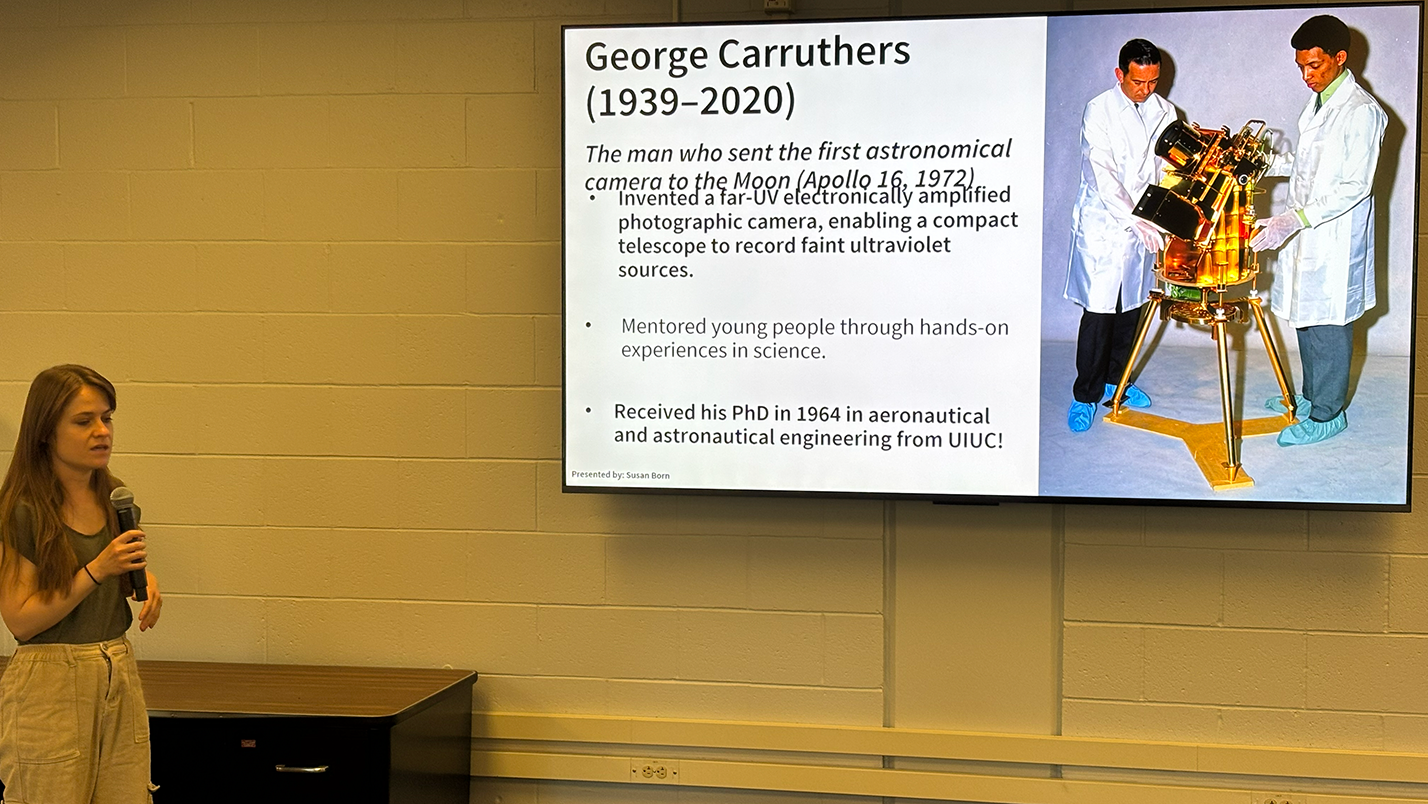 Susan Born presenting George Carruthers