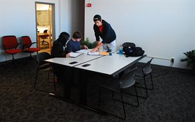 Students taking advantage of the interaction room