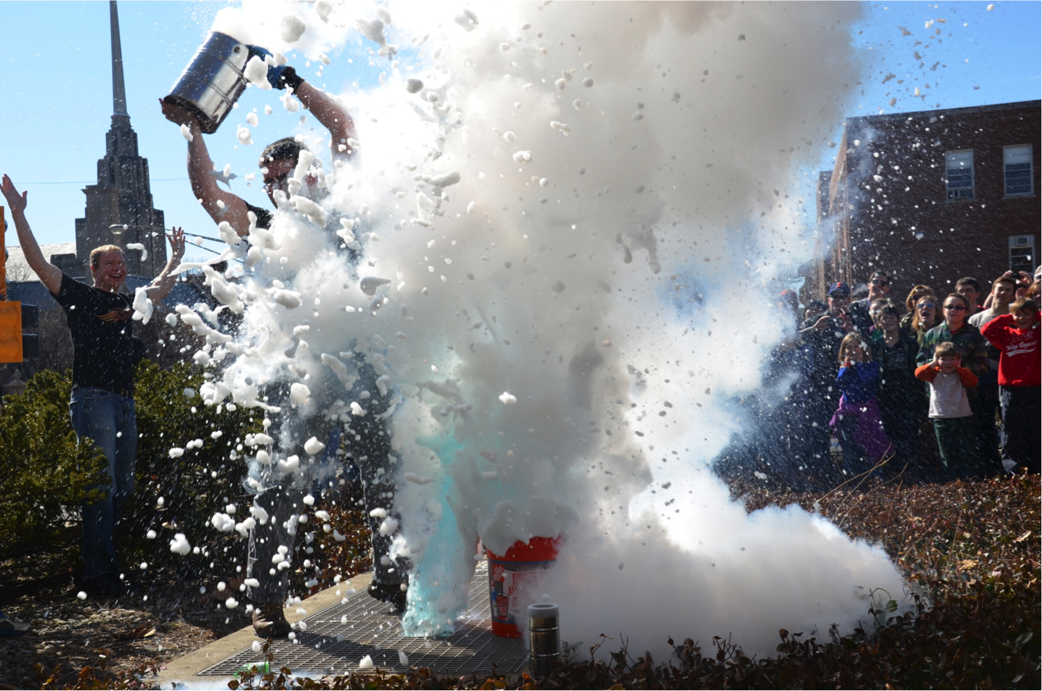 Physics Van members demonstrate a liquid-nitrogen-powered dish soap explosion during Engineering Open House 2014.