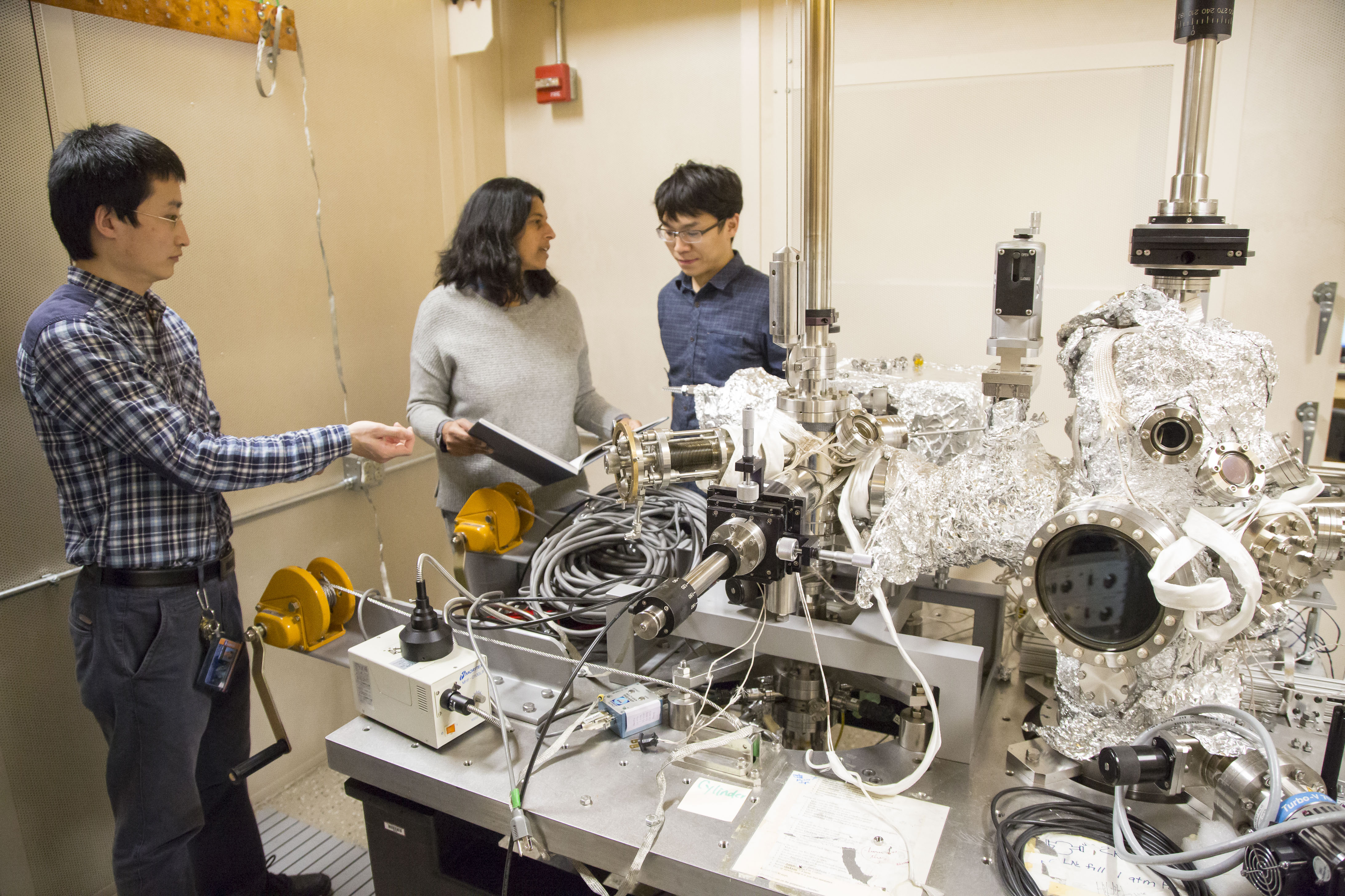 Vidya Madhavan, a professor of physics at the University of Illinois at Urbana-Champaign, works with students in her lab, in the Frederick Seitz Materials Research Lab. Madhavan specializes in condensed matter experimentation. Photo by L. Brian Stauffer, University of Illinois at Urbana-Champaign