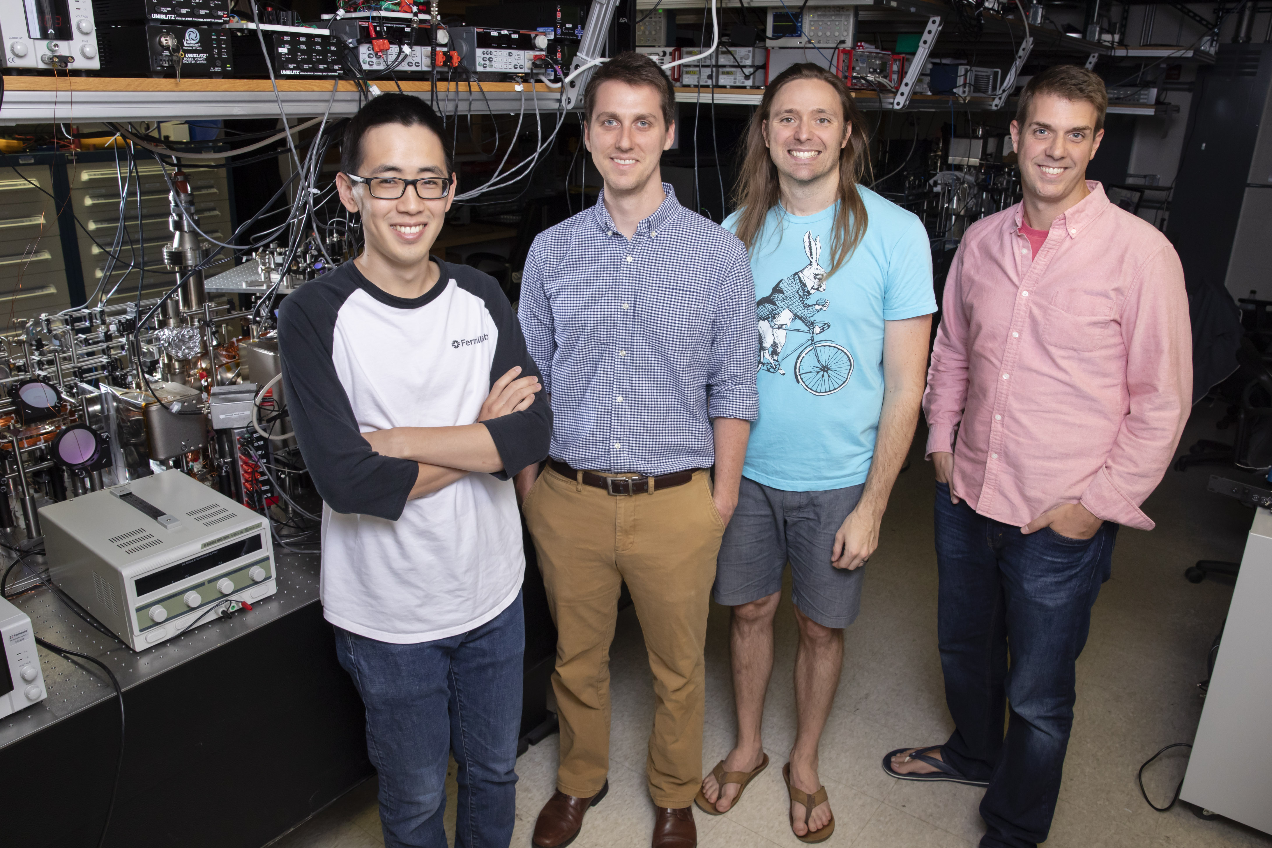 University of Illinois at Urbana Champaign Professors of Physics Bryce Gadway (far right) and Taylor Hughes (second from right) pose with graduate students Alex An (left) and Eric Meier, in Gadway's lab at the Loomis Laboratory of Physics. Photo by L. Brian Stauffer, University of Illinois at Urbana-Champaign