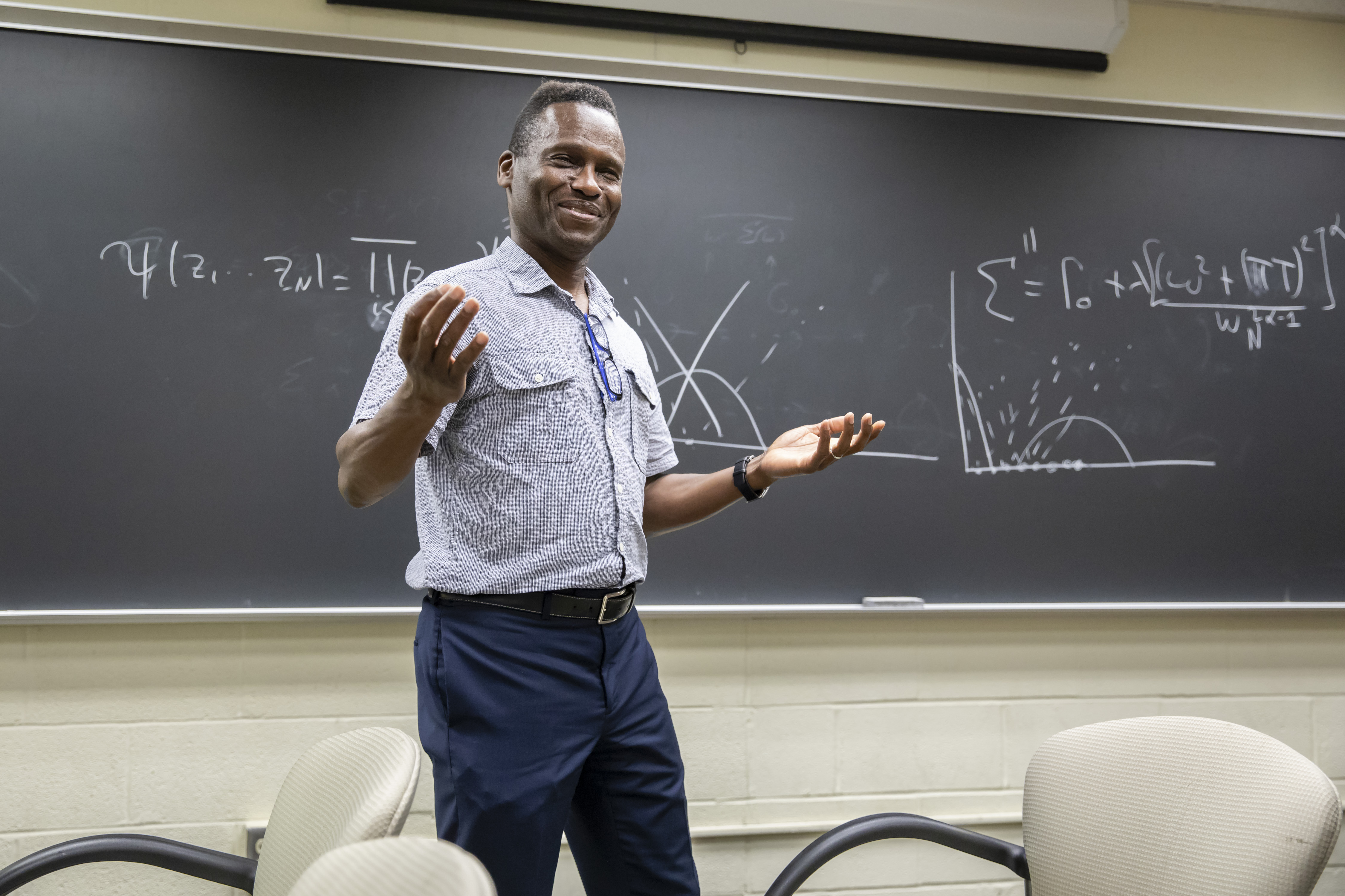 Illinois Physics Professor Philip Phillips presenting to his group at the Institute for Condensed Matter Physics in Urbana. Photo by L. Brian Stauffer, University of Illinois at Urbana-Champaign