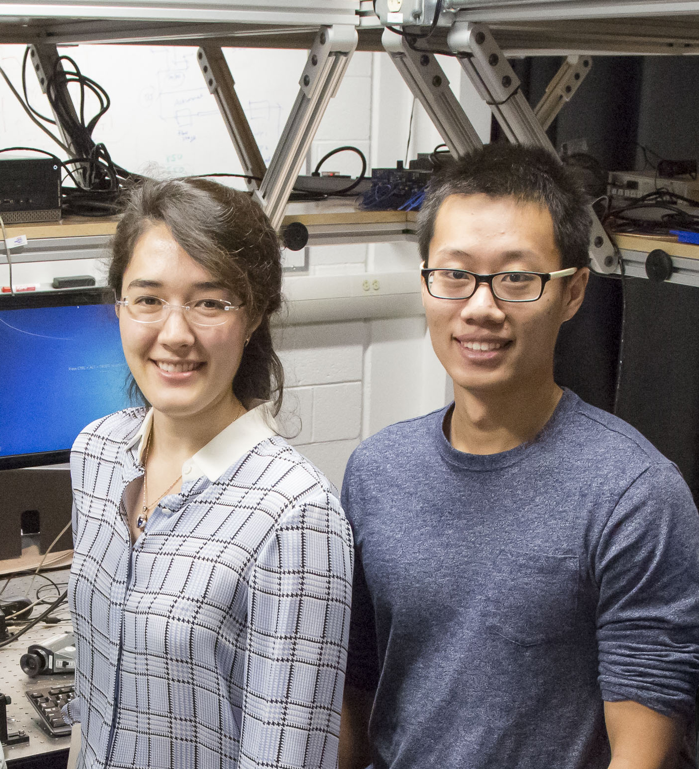 Illinois Physics Professor Virginia Lorenz and her graduate student Wenrui Wang pose in her laboratory at the Loomis Laboratory of Physics in Urbana. Photo by L. Brian Stauffer, University of Illinois at Urbana-Champaign