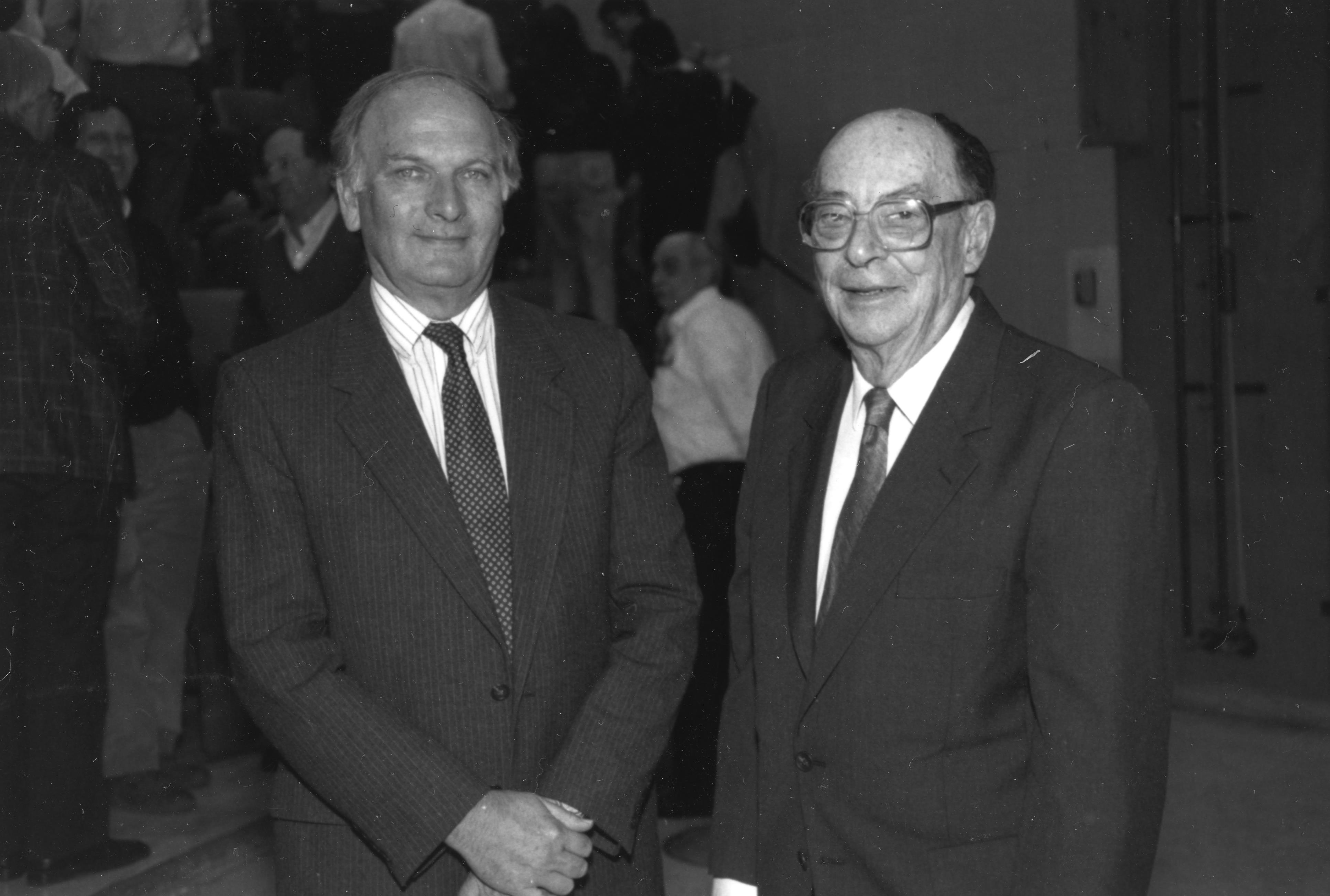 John Robert Schrieffer (left) and John Bardeen at event. Illinois Physics, scanned at the AIP Emilio Segr&egrave; Visual Archives