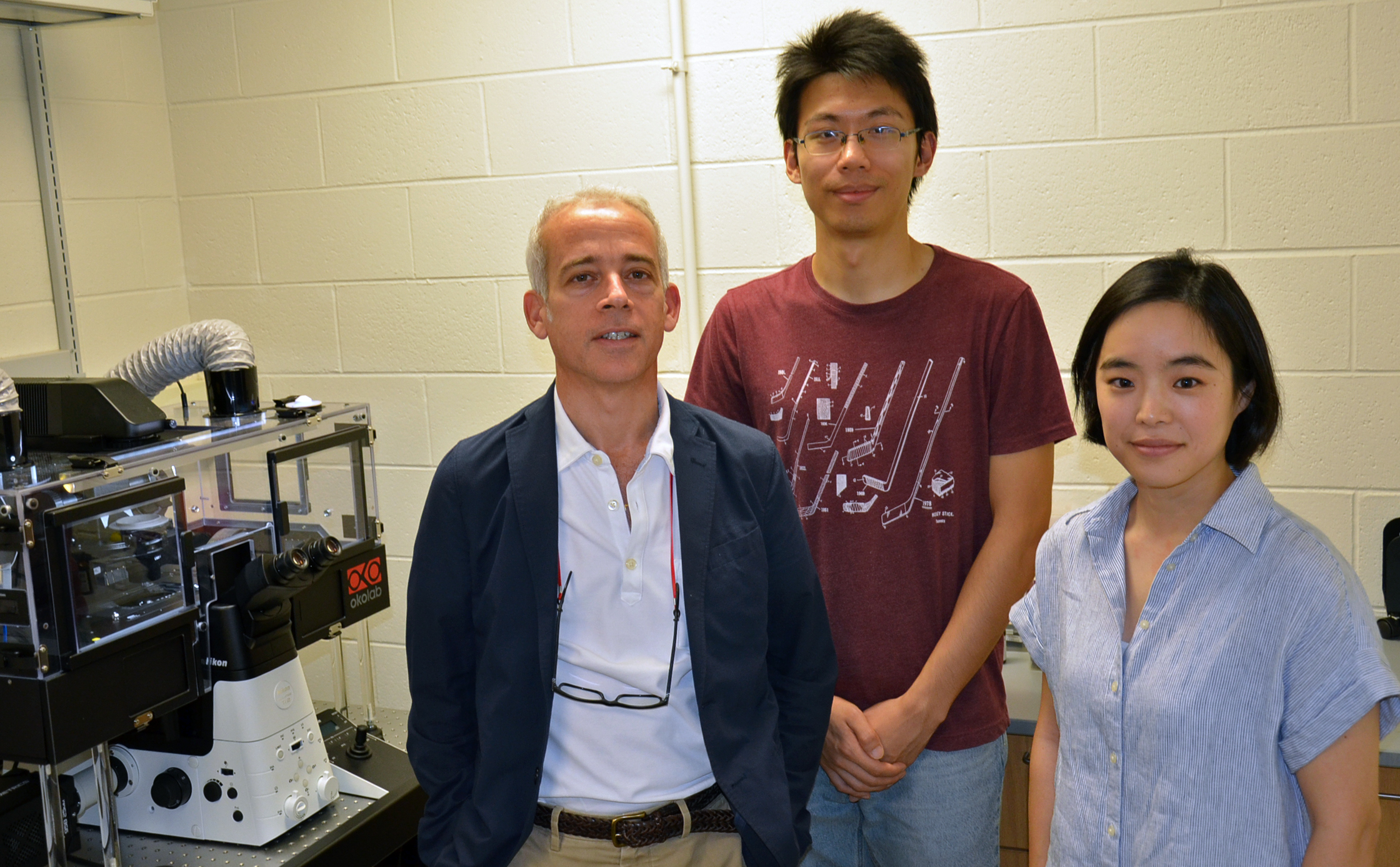 (L-R) Professor Ido Golding, Postdoctoral Researcher Mengyu Wang, and Professor Sangjin Kim pose in Golding's lab at the Center for the Physics of Living Cells in Loomis Laboratory of Physics at the University of Illinois at Urbana-Champaign. Siv Schwink/Illinois Physics