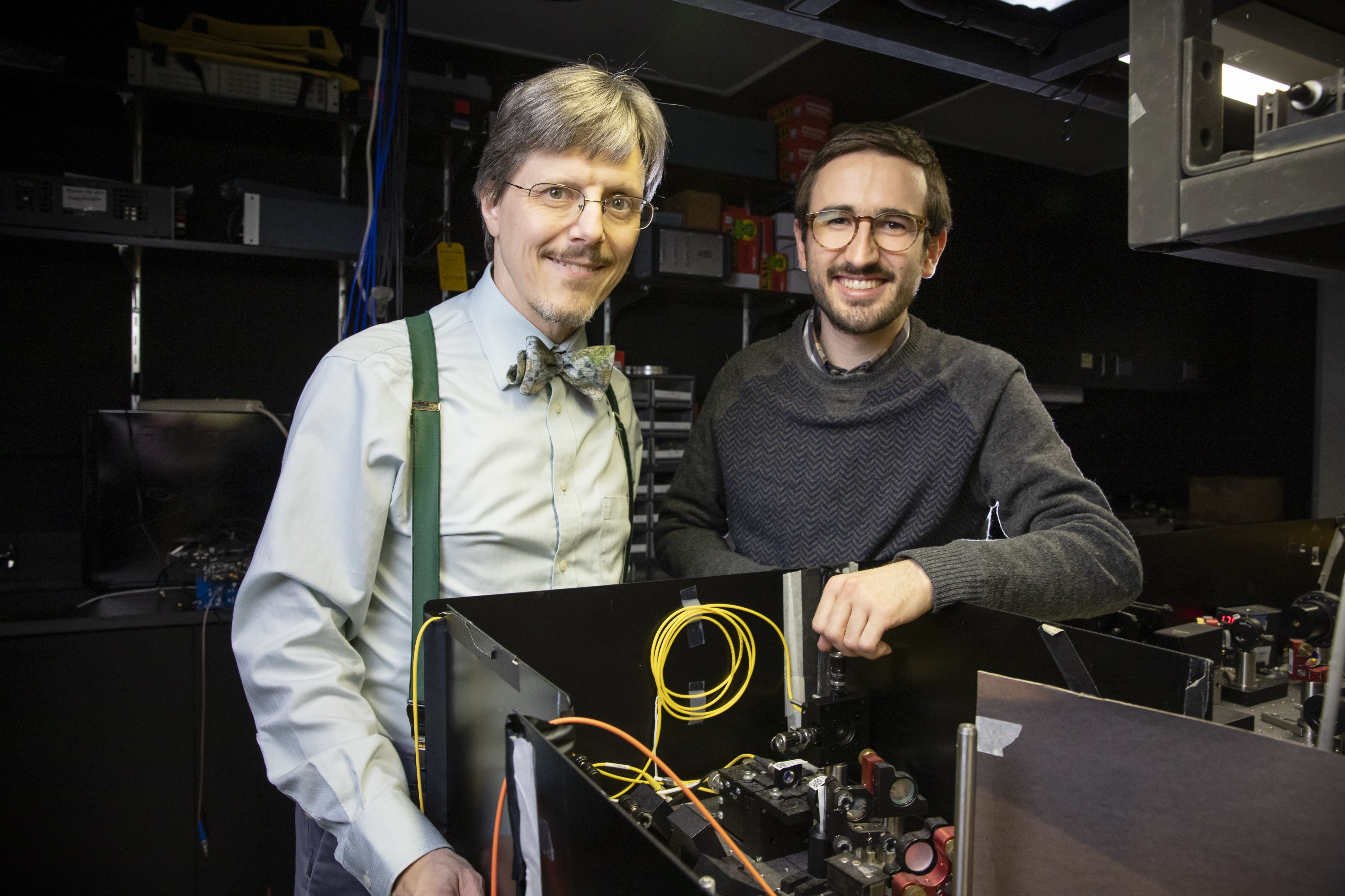 Physics Professor Paul Kwiat (left) and graduate student Colin Lualdi pose in the laboratory at the Loomis Laboratory of Physics in Urbana. Photo by L. Brian Stauffer, University of Illinois at Urbana-Champaign