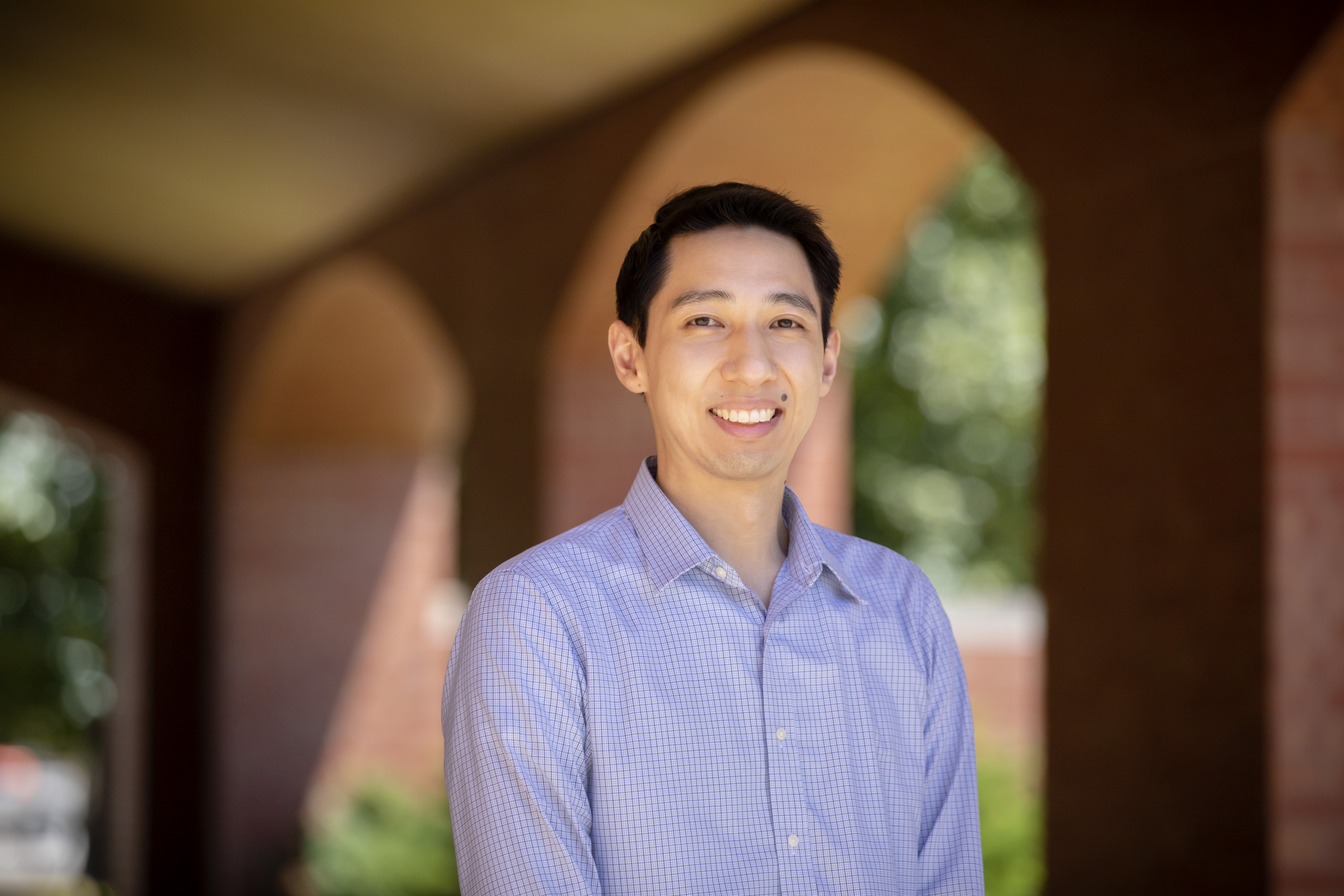 University of Illinois Physics Professor Eric Kuo poses outside the Grainger Engineering Library on the Urbana campus. Photo by L. Brian Stauffer, University of Illinois at Urbana-Champaign