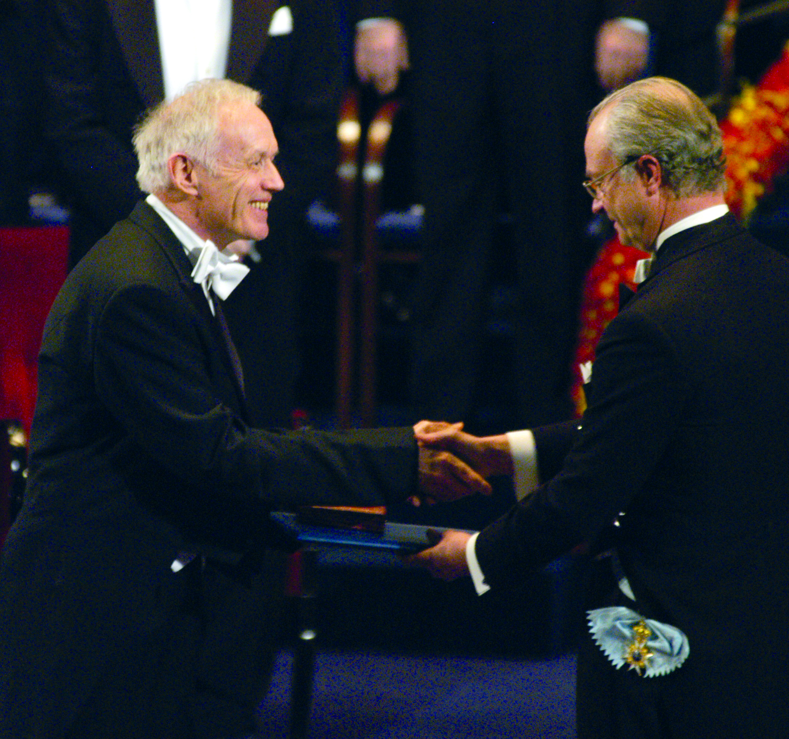 Sir Anthony J Leggett receiving the Nobel Prize