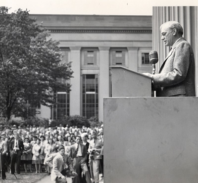 F. Wheeler Loomis, deputy director of the MIT Radiation Laboratory (Rad Lab), addresses the staff on May 8, 1945, VE Day, to announce the end of the war against Germany.