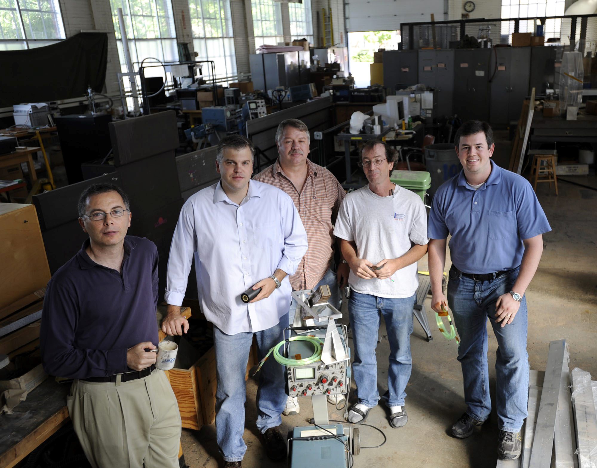 The Illinois Physics ATLAS team is photographed in Physics Lab 1 in Urbana for an article in &lt;em&gt;The News-Gazette&lt;/em&gt; in September 2008. Pictured are (L-R) Professor Tony Liss, Professor Mark Neubauer, high-energy physics technician Dave Forshier, Professor Steve Errede and graduate student James Coggeshall. Photo by John Dixon/The News-Gazette