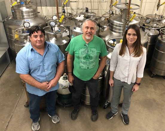 The Liquid Helium Facility Team: pictured left to right are cryogenics technician Kelly Sturdyvin, senior research engineer Eric Thorsland, and cryogenics programmer Nikki Colton. Photo by Rebecca Wiltfong, Illinois Physics