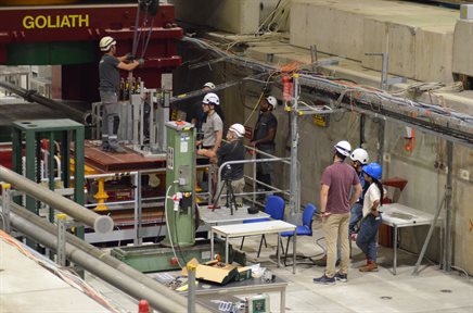 ATLAS Experiment ZDC/RPD group members from University of Illinois Urbana-Champaign, Columbia University, Brookhaven National Laboratory, and Ben-Gurion University watch as a CERN transport team cranes ZDC detectors into position.