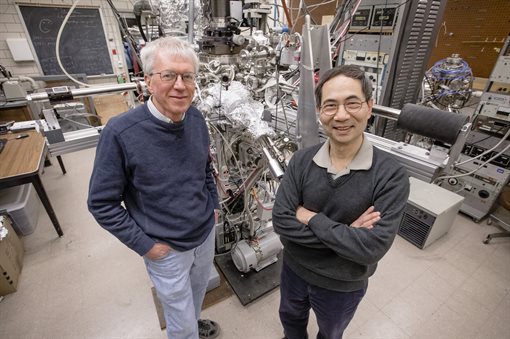 James Eckstein (left) and Tai-Chang Chiang stand in front of the atomic layer-by-layer molecular beam epitaxy system used to grow the &amp;amp;amp;amp;quot;flip-chip&amp;amp;amp;amp;quot; topological insulator thin-film samples for their research.