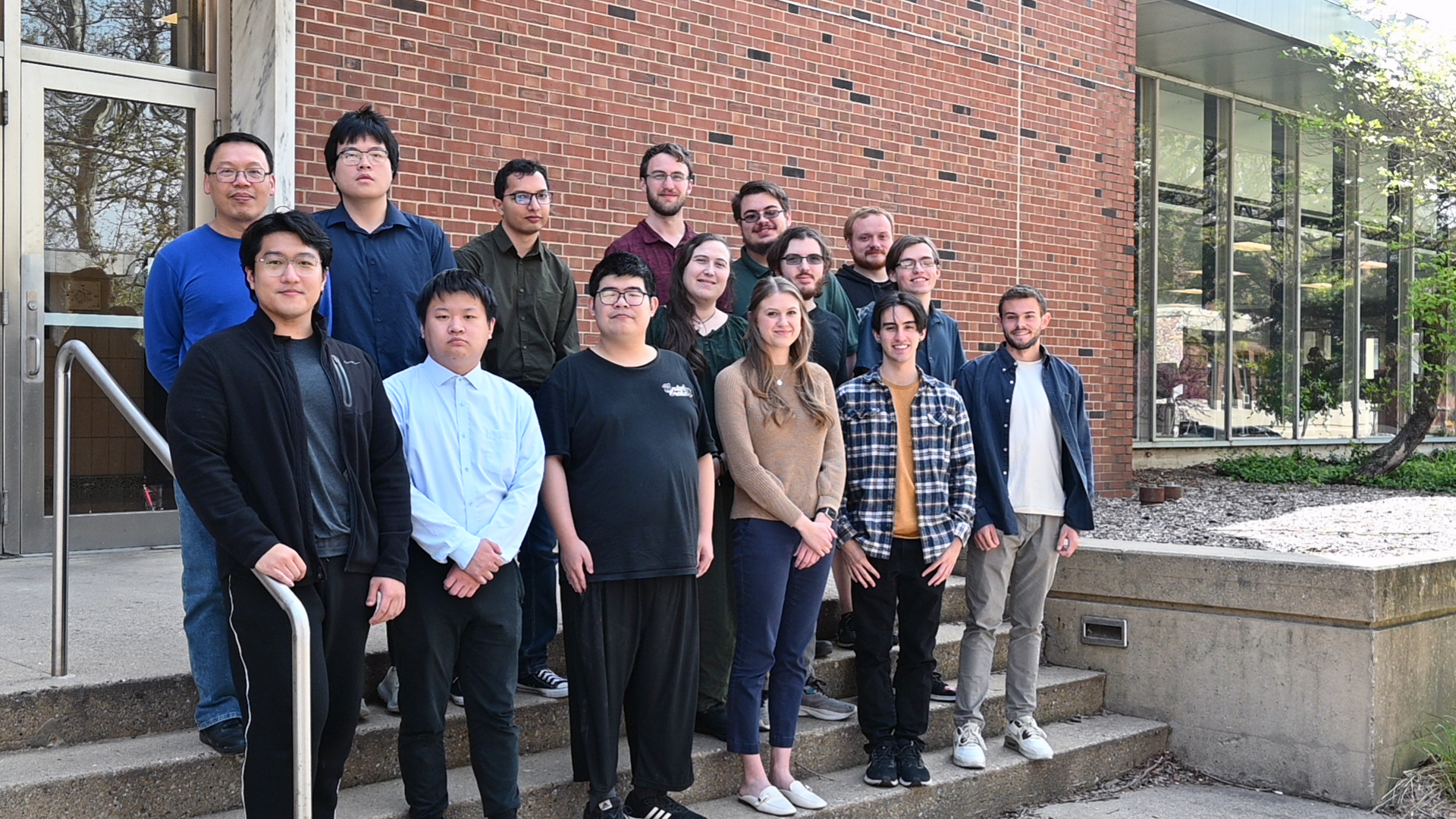 Jack Roberts (far right) poses with the inaugural MEng in Instrumentation and Applied Physics class outside Loomis Laboratory of Physics.